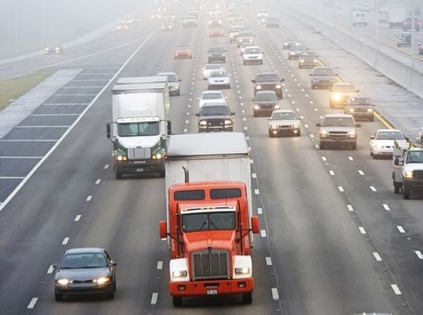 Trucks and cars driving on the interstate