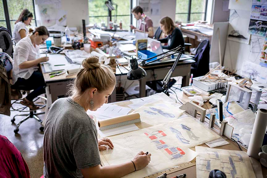 Students working in an architecture studio class