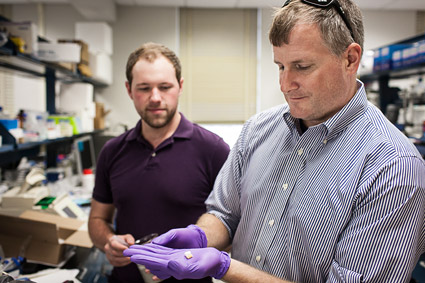 two men in lab