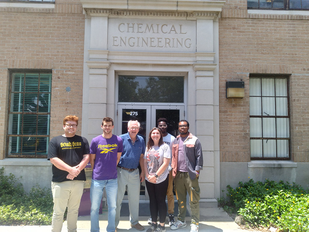 Group photo of Professor Dooley with students