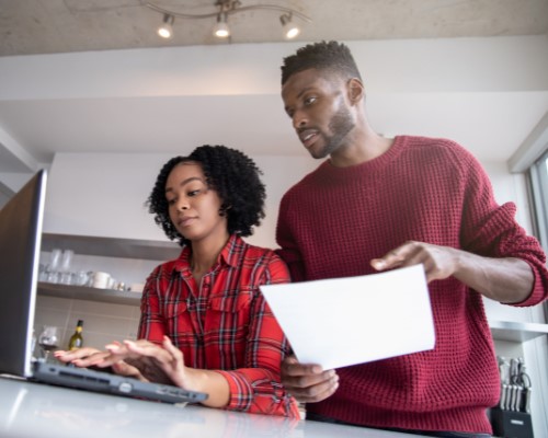 two people around computer